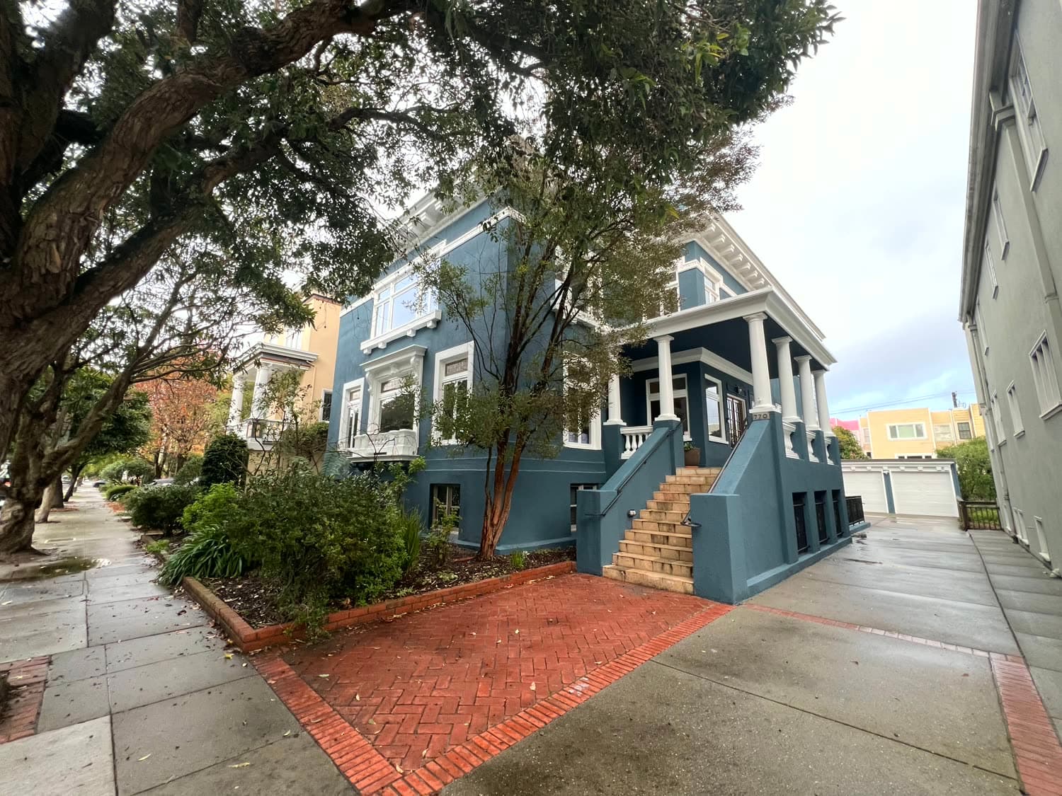 A grand Edwardian home in San Francisco's Richmond District, restored and painted deep blue