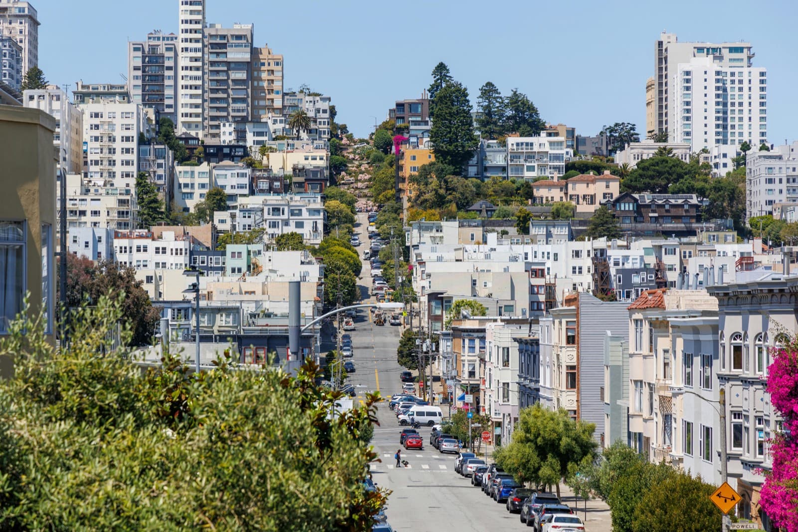 Looking up toward Russian Hill and the crooked, flower-lined block of Lombard Street, San Francisco